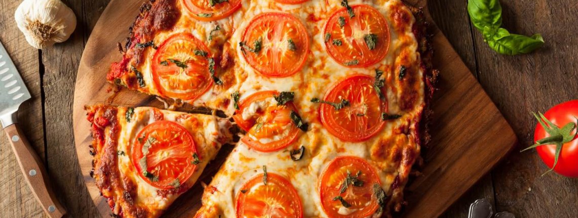Homemade Vegan Cauliflower Crust Pizza with Tomato and Basil