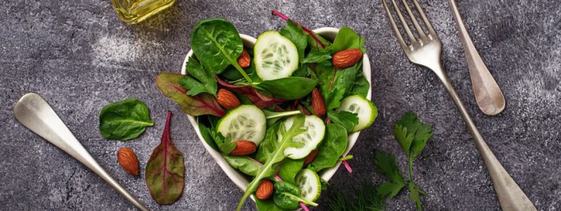 Salad mix with cucumber and almond. Healthy food concept. Selective focus